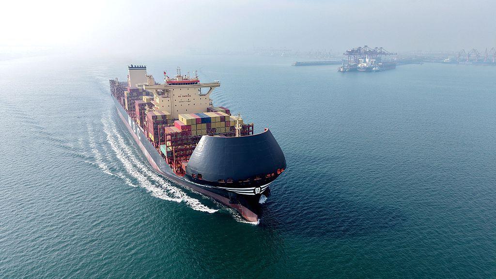 A cargo ship loaded with foreign trade containers departs from Qingdao Port in Qingdao City, Shandong Province, China, on January 4, 2026. 