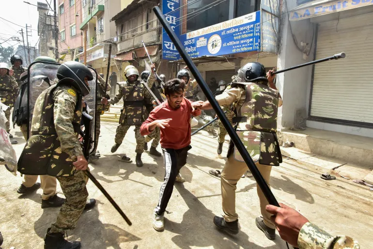 Police officers attack a demonstrator near Ujjain’s Shahi Masjid, September 28, 2026 [Reuters]
