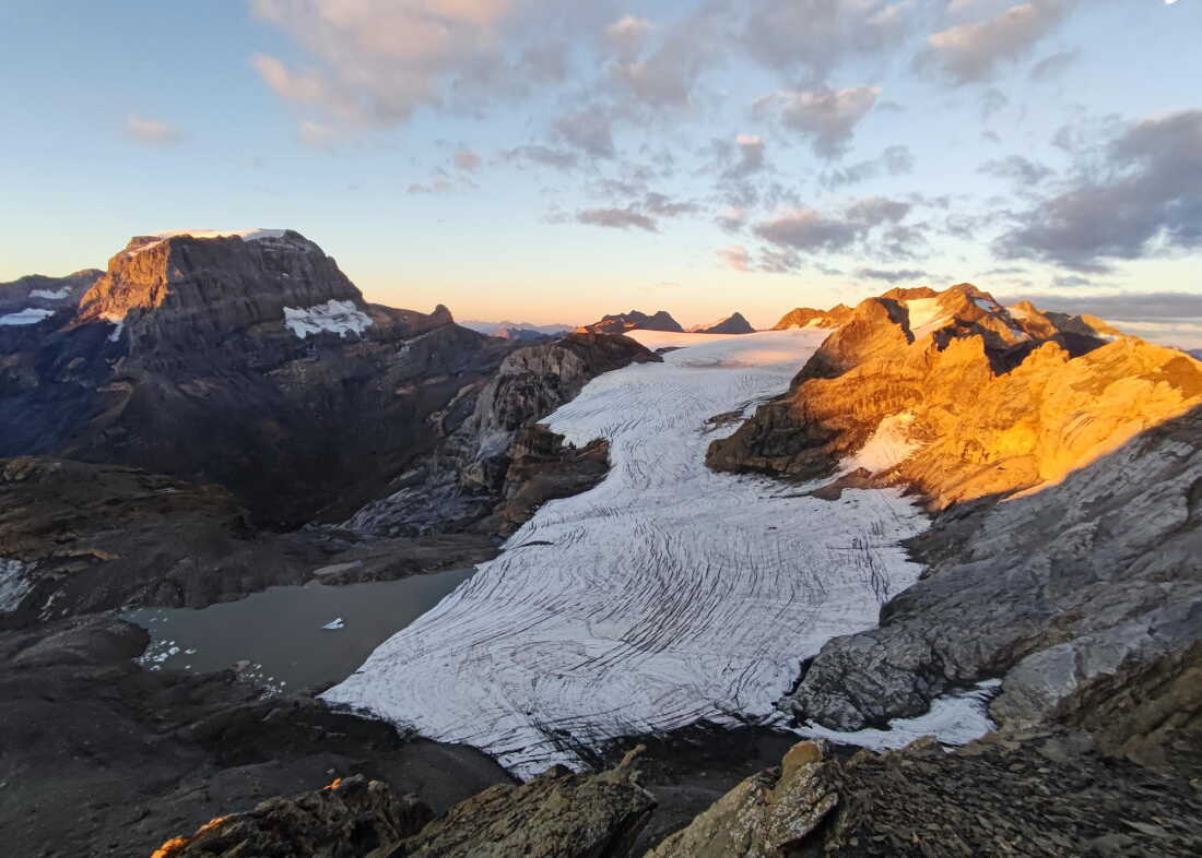 A Swiss glacier shows the effects of years of ice loss, with exposed rock replacing ice that once covered the landscape.