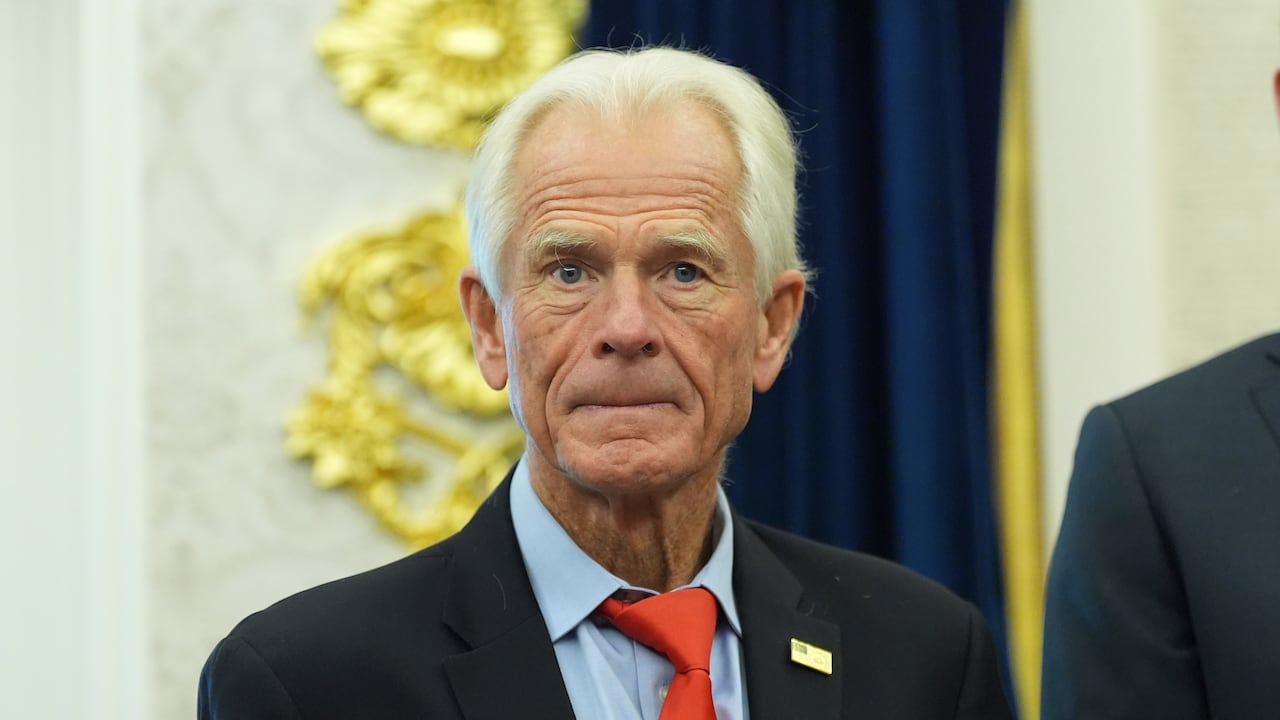A man is seen wearing a suit and tie.