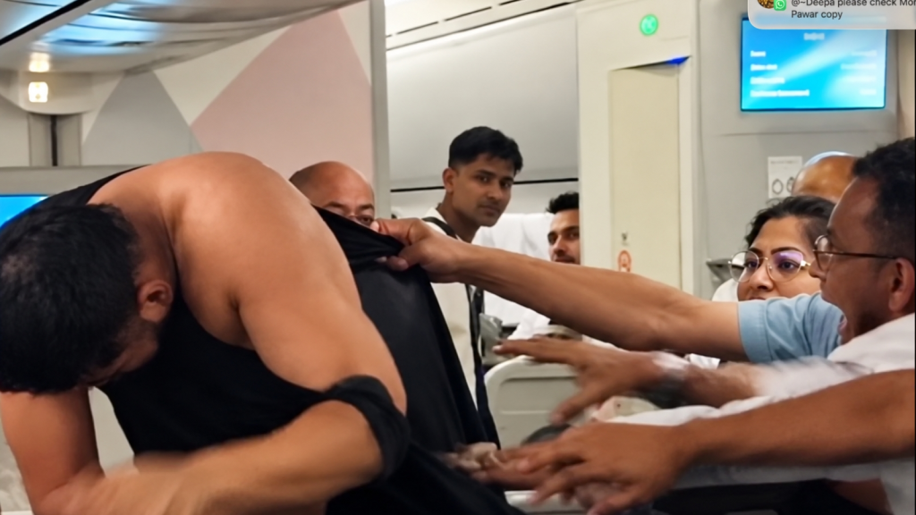 The footage circulating on social media shows the two men arguing inside the aircraft before exchanging punches. Other passengers can be seen watching the confrontation as the fight escalates. (Screengrab/image enhanced using AI)