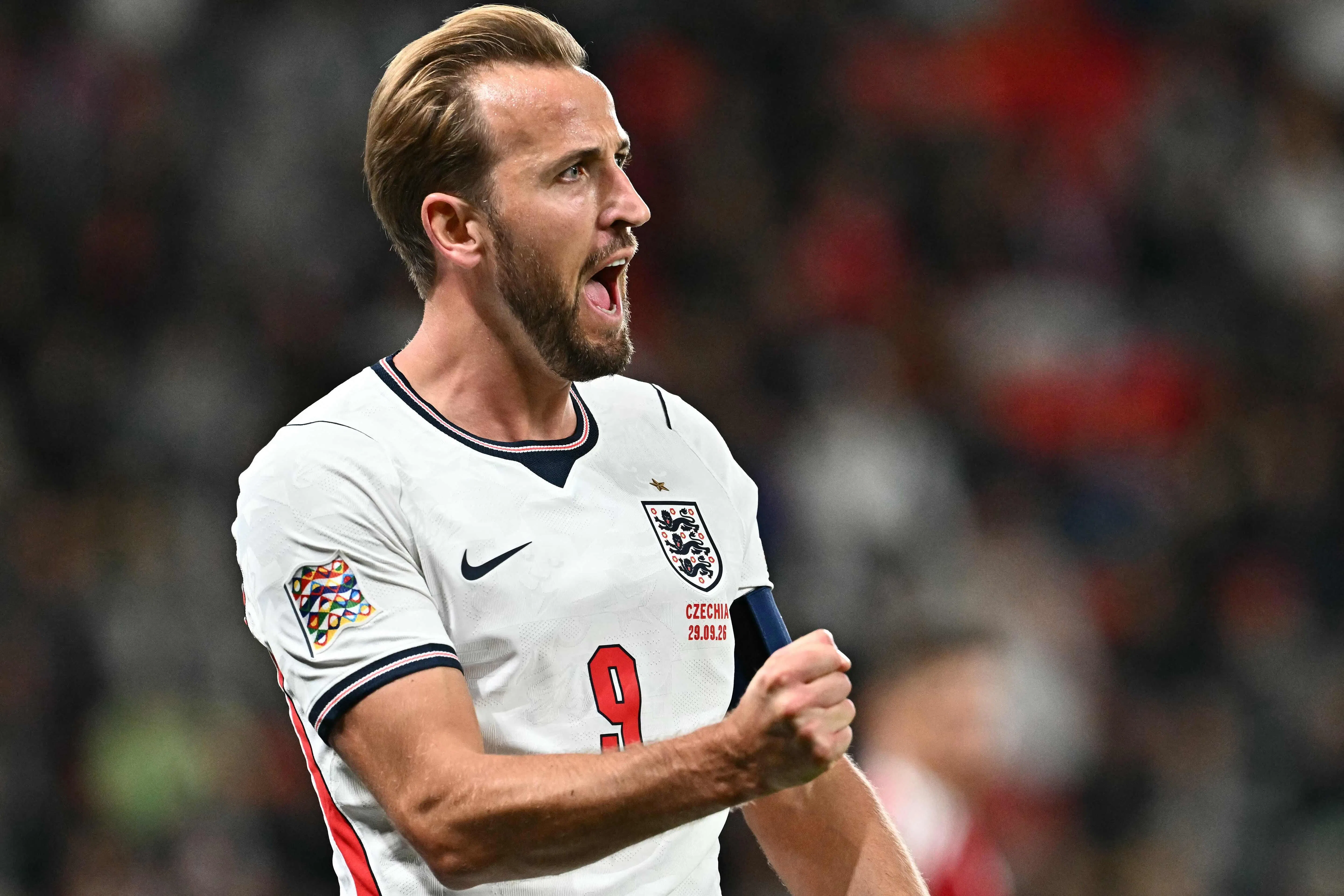 TOPSHOT - England's striker #09 Harry Kane celebrates scoring the 0-2 goal with his teammates during the UEFA Nations League Group A3 football match between the Czech Republic and England at Fortuna Arena in Prague on September 29, 2026. (Photo by Joe Klamar / AFP)