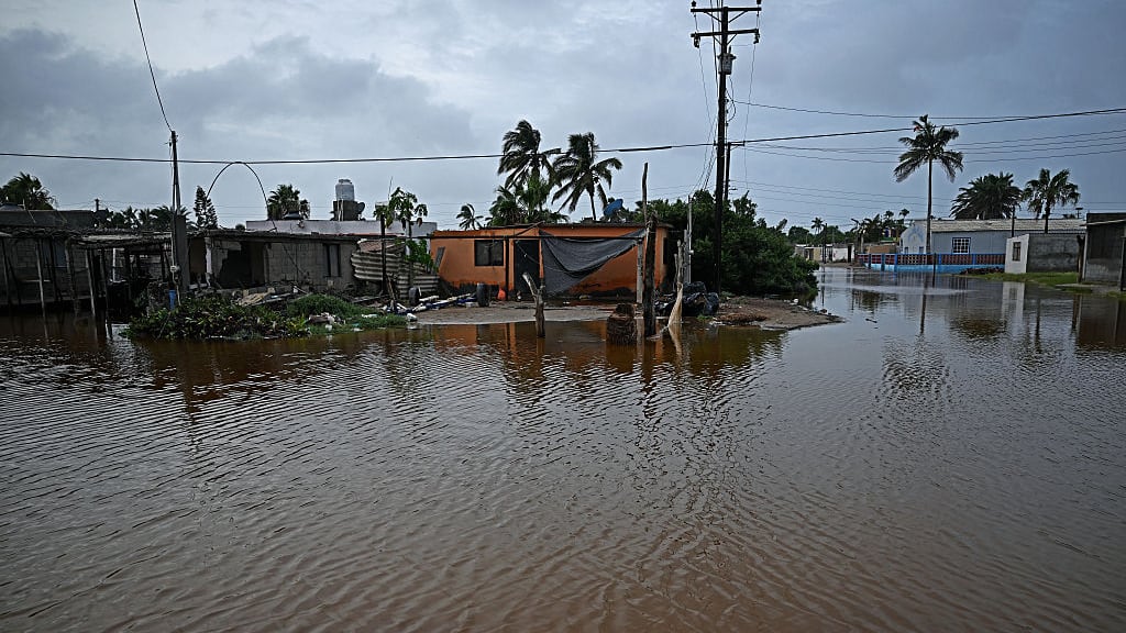 A view of a street in Puerto San Carlos, Mexico, which was flooded as a result of Hurricane Polo.