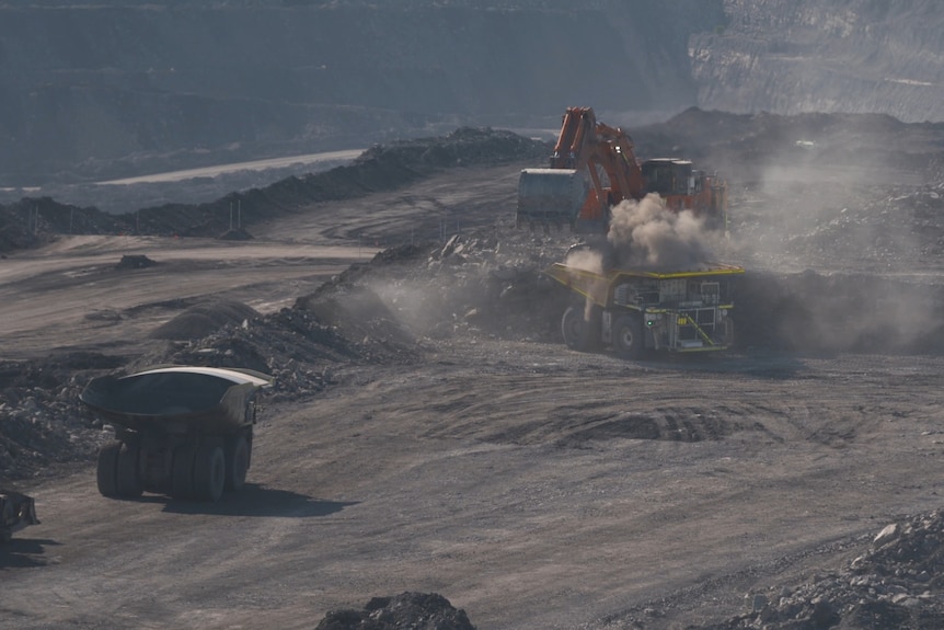 a truck is filled in a mine pit
