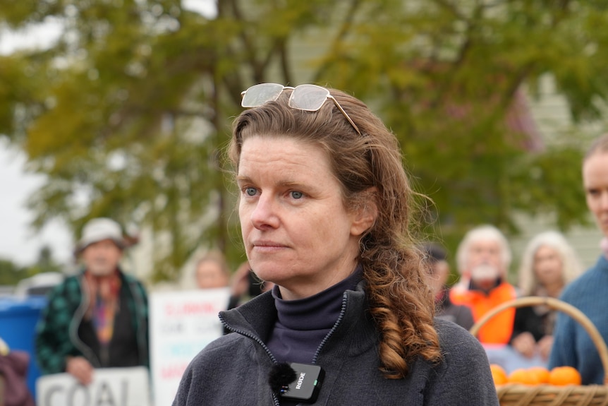 Georgina Woods giving a press conference