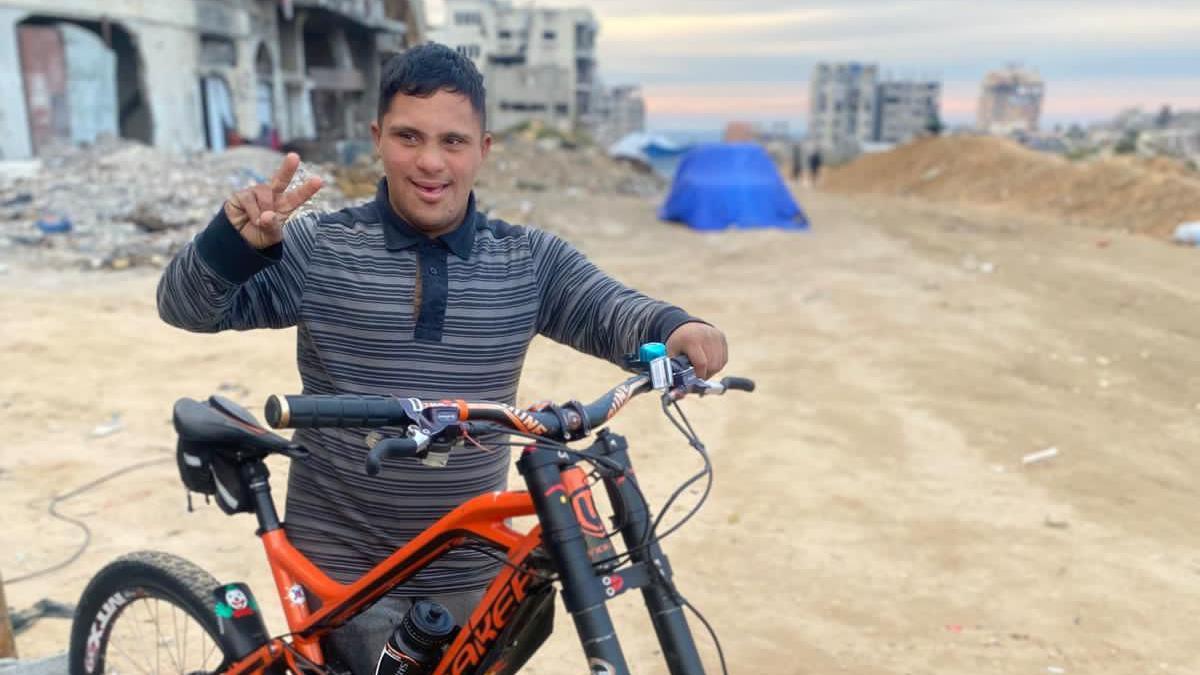Ahmed al-Madoun poses with a bike. 