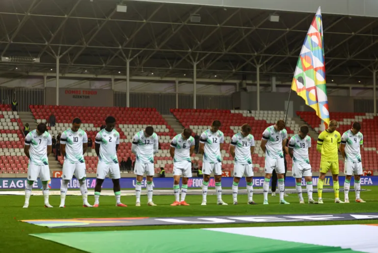 Soccer Football - Nations League - Group B3 - Israel v Republic of Ireland - Nagyerdei Stadion, Debrecen, Hungary - September 27, 2026 Republic of Ireland players wearing black armbands in recognition of all lives lost in the Gaza conflict bow their heads and during the Israel national anthem before the match REUTERS/Bernadett Szabo
