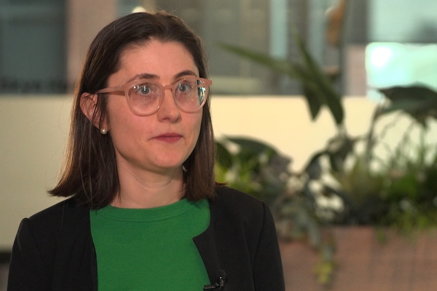 Mortgage Stress Victoria CEO Nadia Harrison wears a green top and black jacket