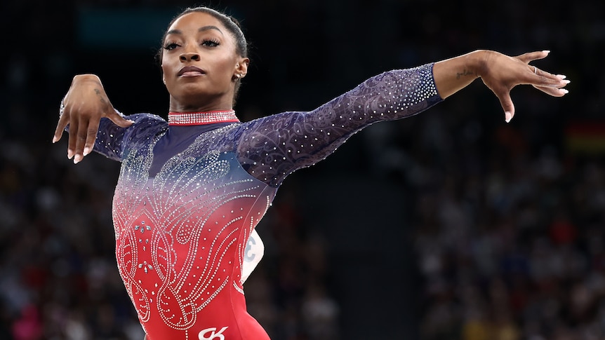 Simone Biles competing at 2024 Paris Olympics.