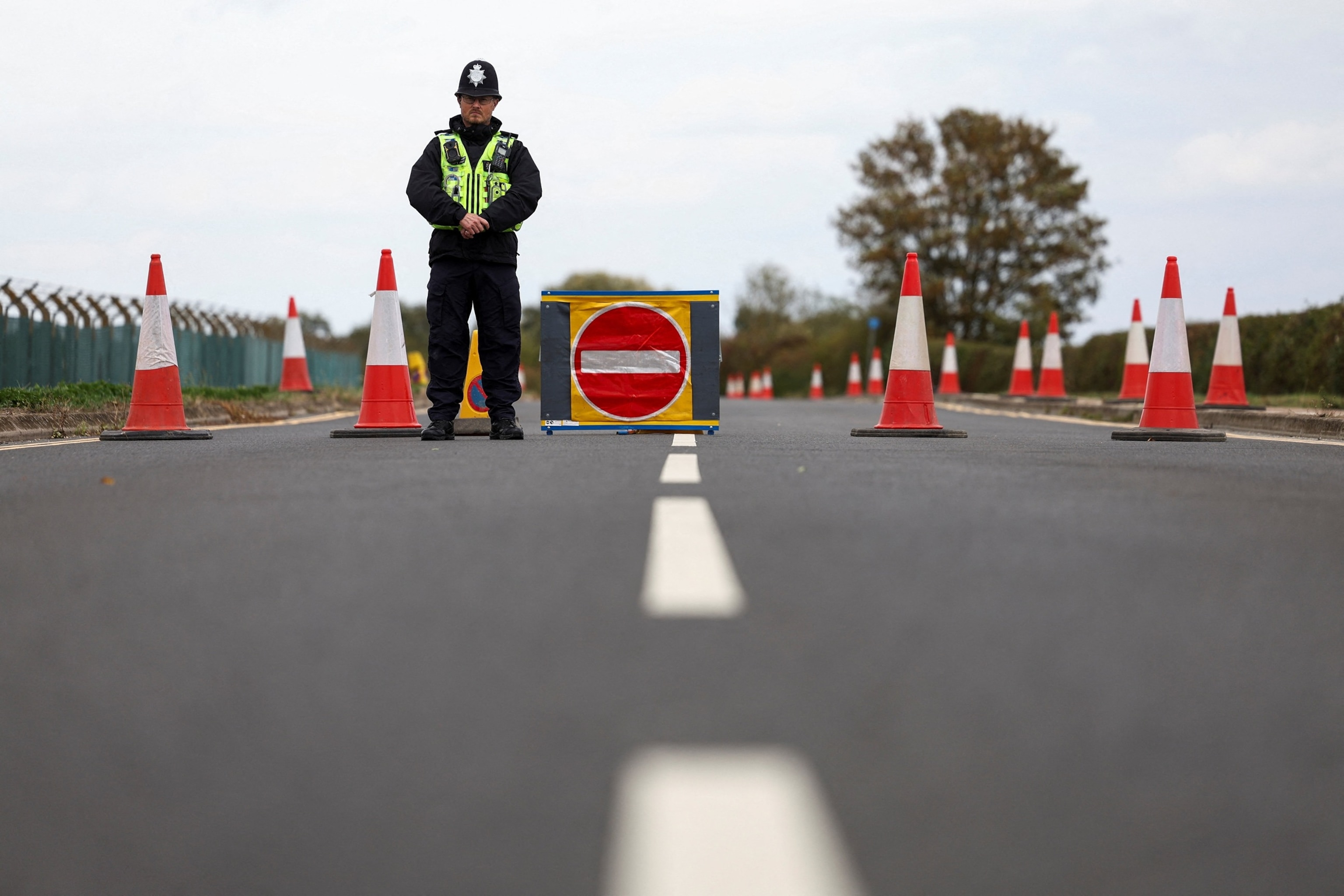 PHOTO: A police officer stands guard at a road closure outside the perimiter of the RAF Fairford airbase in Fairford, Gloucestershire, Britain, Sept. 27, 2026. 