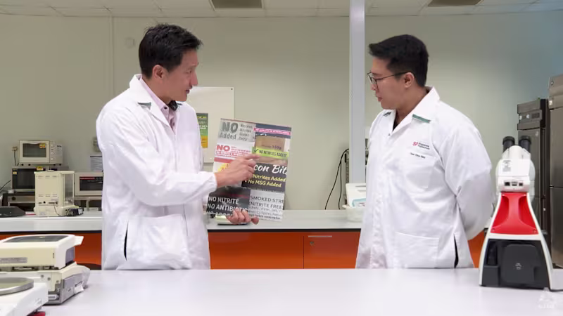 Chia going through various food labels with Chew Chon Mun, the chair of Singapore Polytechnic’s advanced diploma course in applied food science.