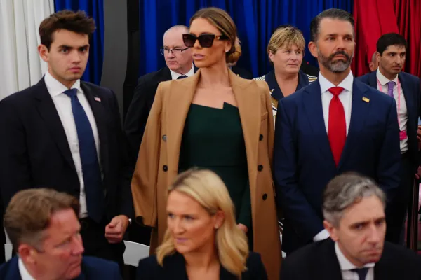 From center right, Donald Trump Jr, his wife Bettina and son Donald Trump III wait for a meeting between US President Donald Trump and US embassy staff at Deerfield Residence in Dublin. (AP FILE)
