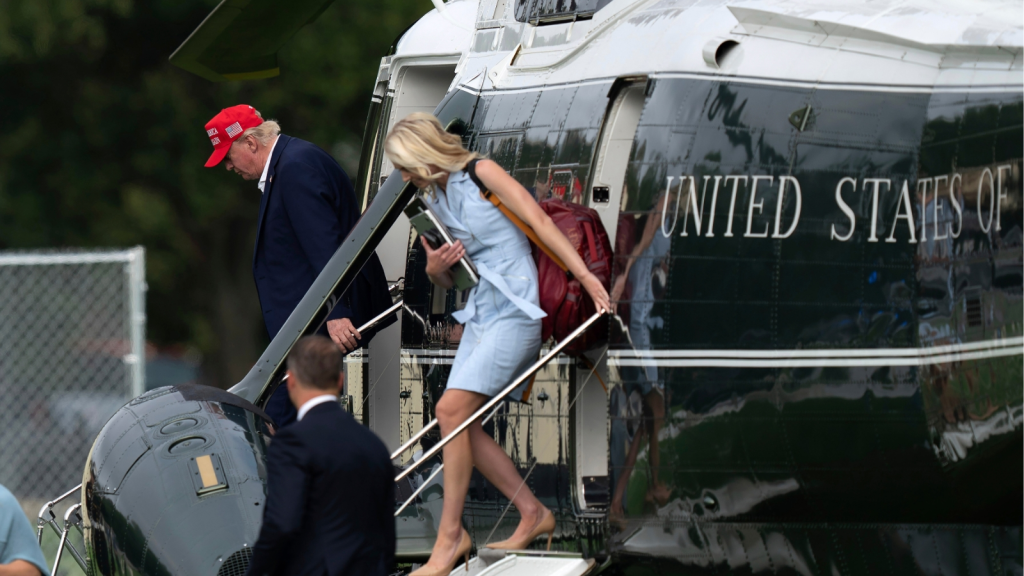 President Donald Trump and executive assistant Natalie Harp. (AP Photo)