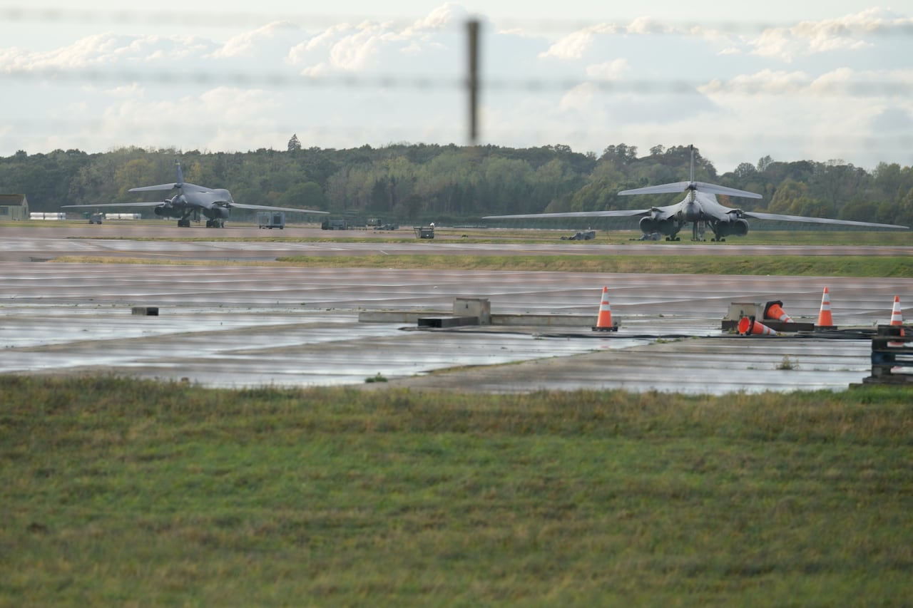 Aircraft are seen on a tarmac