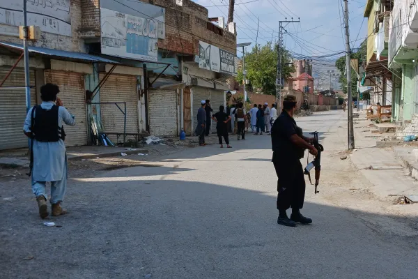 Police officers secure a road leading to the site of a powerful bomb at a mosque in Kohat, Pakistan, Friday, September 18, 2026. (AP Photo)