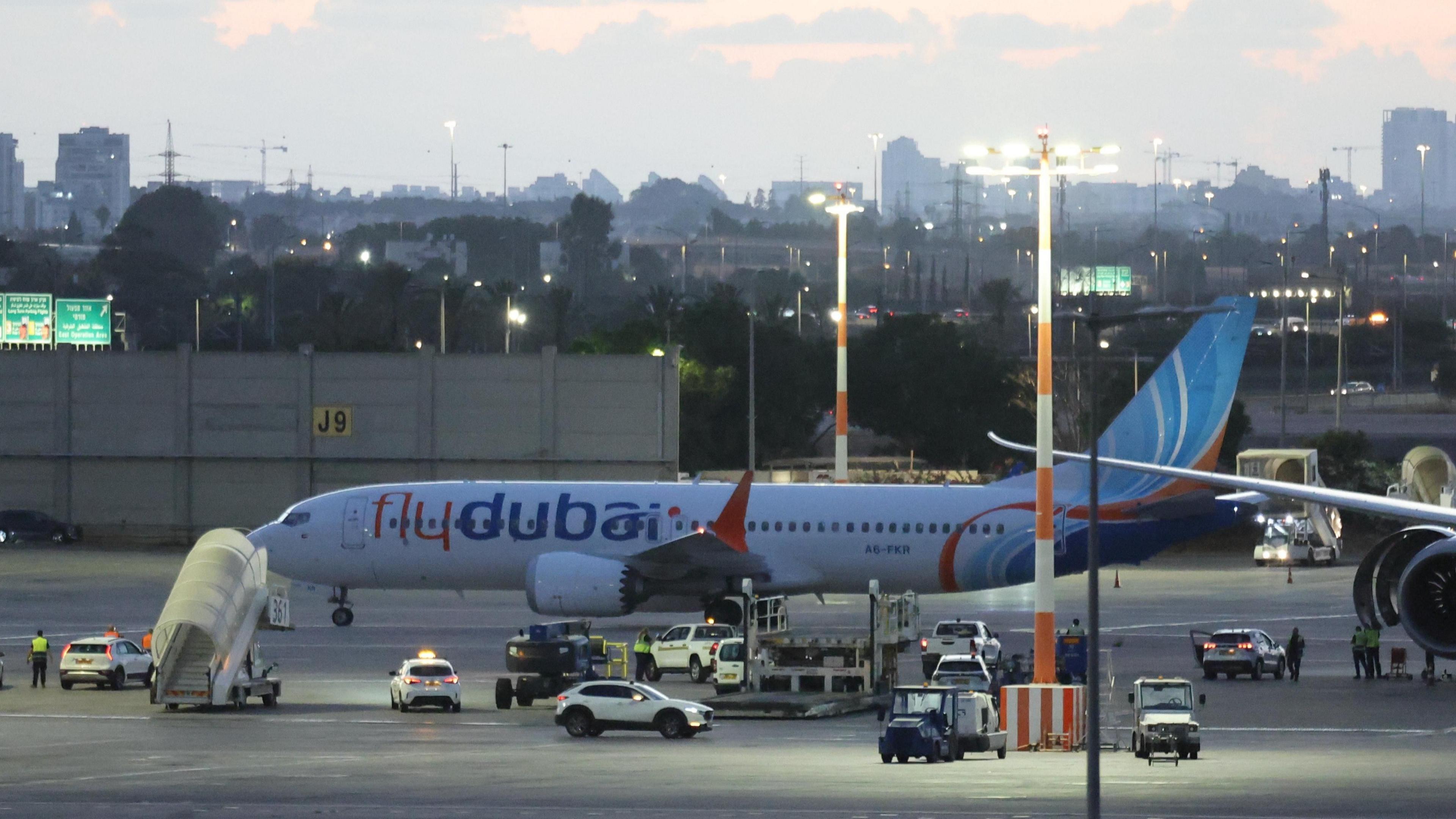 A Flydubai aircraft carrying passengers from Tabuk, Saudi Arabia, stands on the tarmac after landing at Ben Gurion International Airport near Tel Aviv.