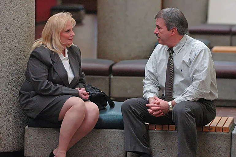 iFebruary 27, 2006; Knoxville, TN, USA; May Martinez sits with retired Knoxville Police department detective Randy York outside of a Knox County Court Room Monday morning. Martinez and York were at the court house for a post conviction relief hearing for the killer of Martinez daughter Colleen Slemmer. Randy York was the lead detective in the case. Christa Gail Pike was sentenced to death in 1995 for the torture-slaying of Colleen Slemmer, a fellow job corps student was in court Monday before Ju