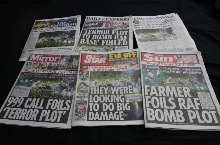 British newspaper front pages reporting the police declaration of a major incident at RAF Fairford airbase, following the arrest of five men on suspicion of offences under the Explosives Act, in this illustration, September 28, 2026. REUTERS/Toby Melville/Illustration