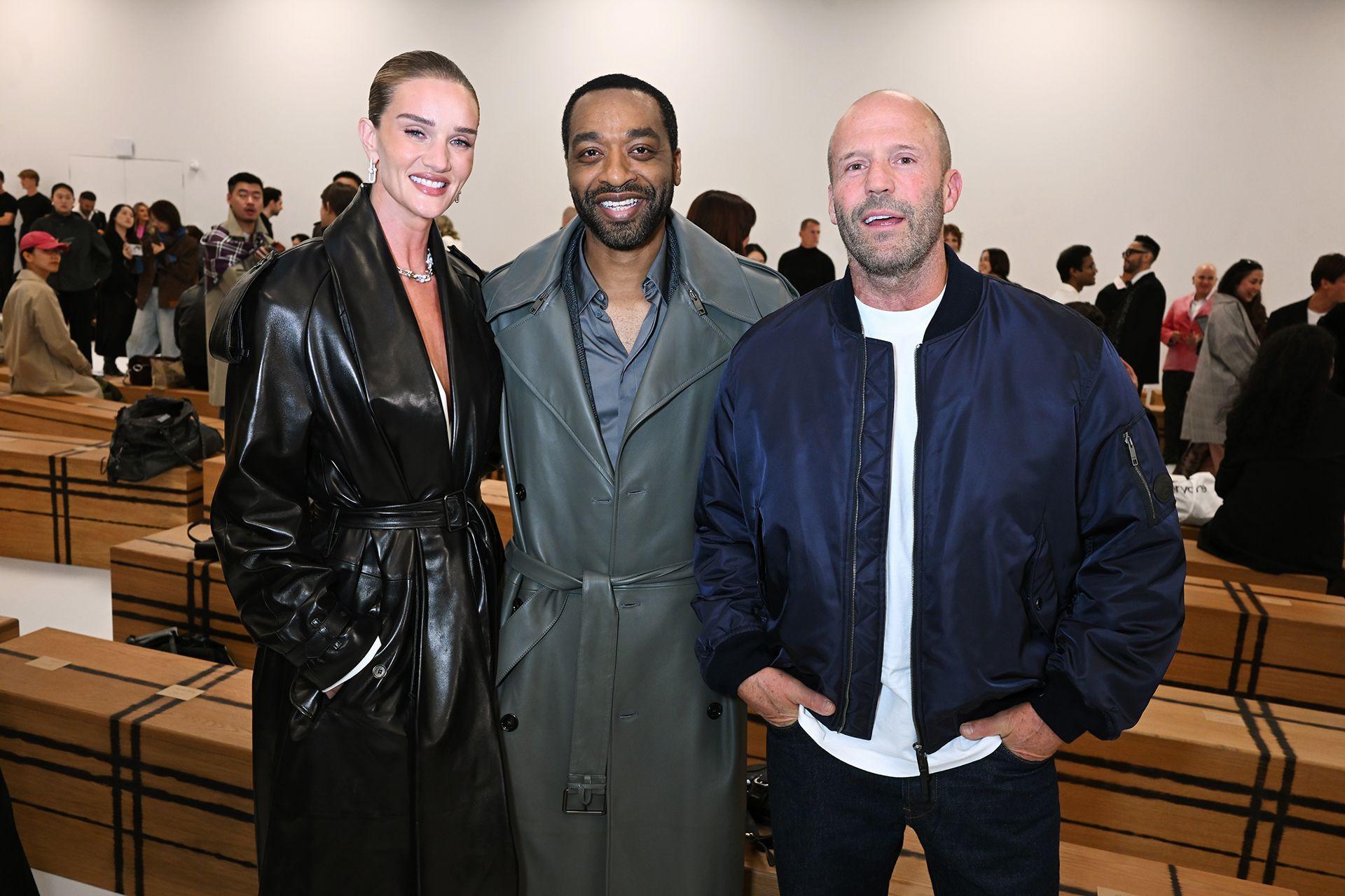 Rosie Huntington-Whiteley, Chiwetel Ejiofor and Jason Statham attend the Burberry Summer 2027 during London Fashion Week at Chelsea College of Arts on September 21, 2026 in London, England. 