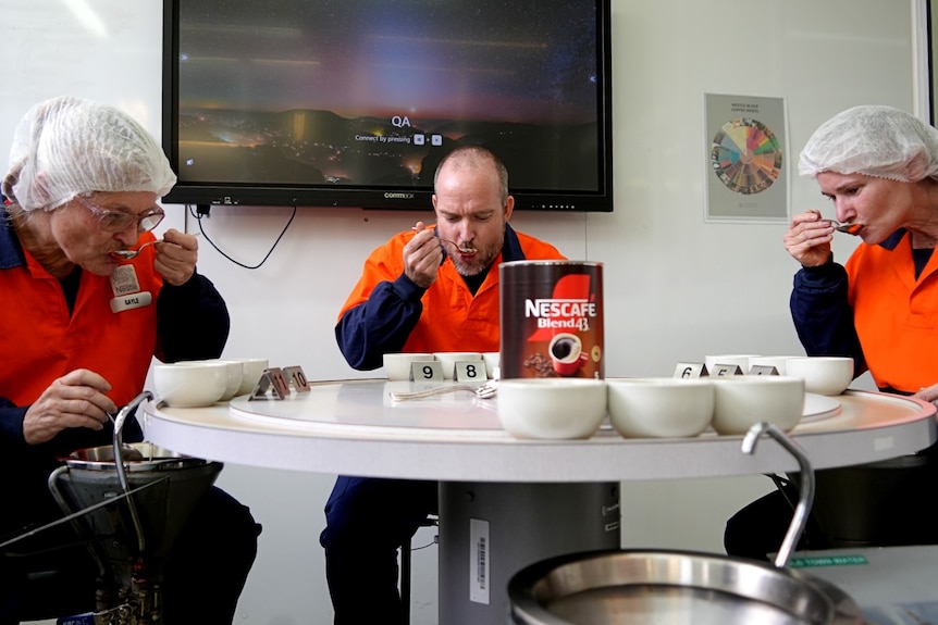 Group of people sitting and drinking coffee