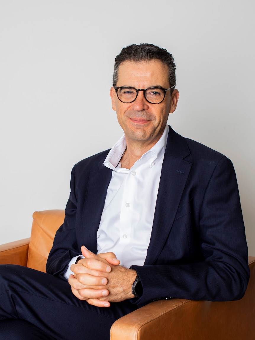 Man smiling in business shot